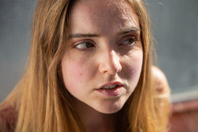 Close-up portrait of a beautiful young woman