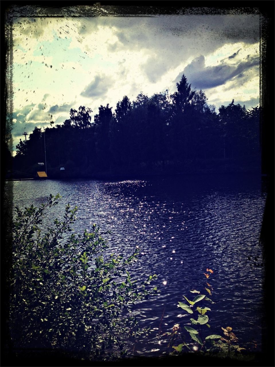 transfer print, water, sky, auto post production filter, tree, cloud - sky, tranquil scene, tranquility, lake, beauty in nature, scenics, cloud, nature, river, waterfront, rippled, cloudy, reflection, idyllic, outdoors