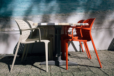 Empty chairs and table in restaurant