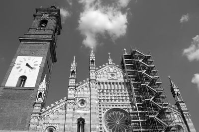 Low angle view of cathedral against cloudy sky