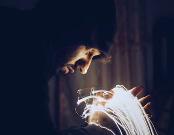 Mam looking at light trails on hand