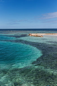 View of sea against blue sky