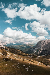 Scenic view of landscape and mountains against sky