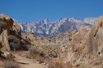 Scenic view of rocky mountains against clear sky