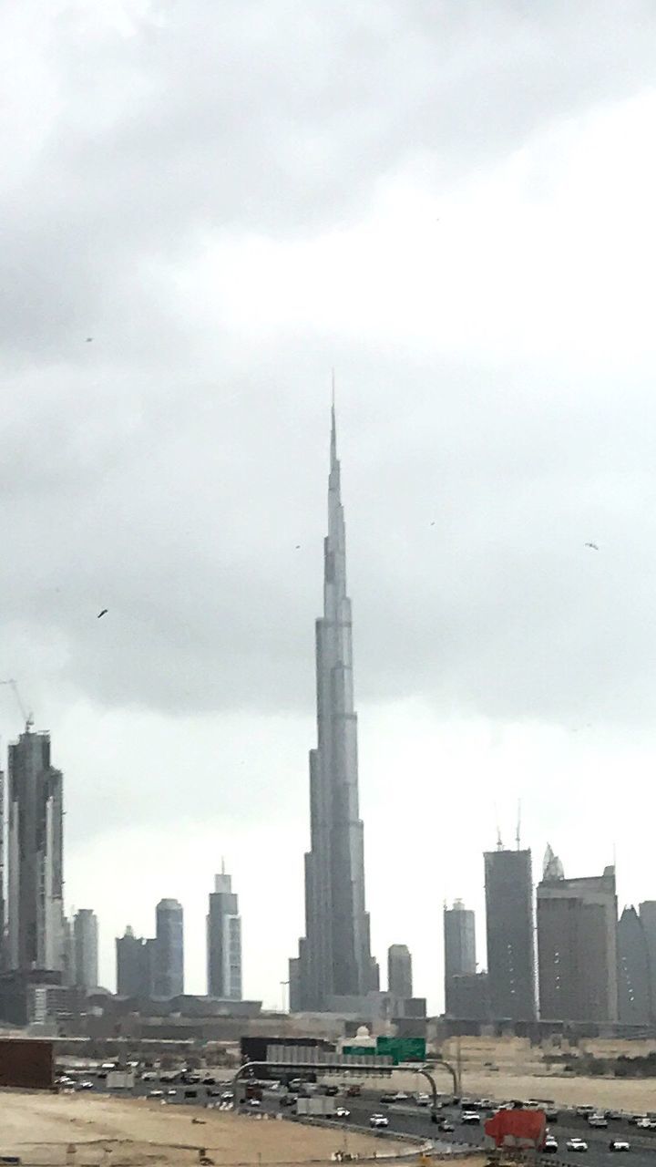 city, architecture, building exterior, built structure, sky, tower, cloud - sky, travel destinations, cityscape, outdoors, day, skyscraper, no people