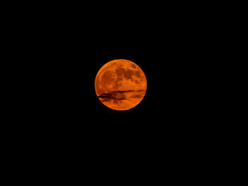 Scenic view of moon against clear sky at night