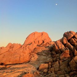 Scenic view of rocky mountains against clear sky