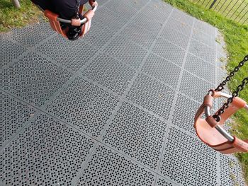 High angle view of people relaxing on floor