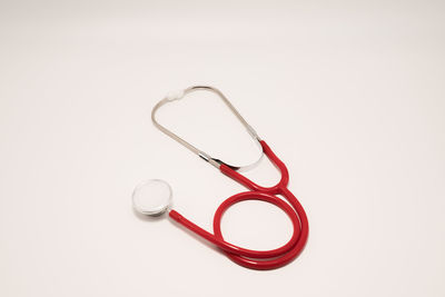 Close-up of stethoscope against white background