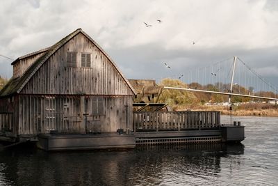 Bridge over river against sky