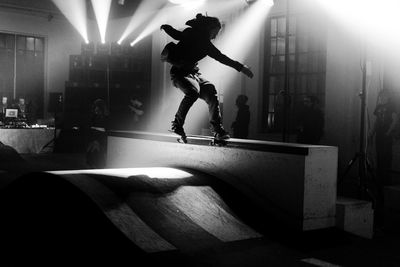 Full length of man skateboarding on skateboard