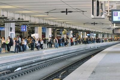 People at railroad station