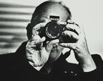 Portrait of man photographing