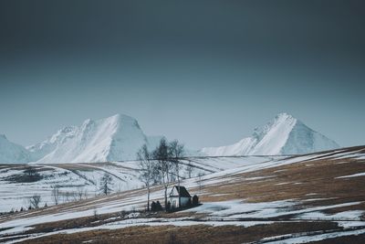 Snow covered mountain against sky