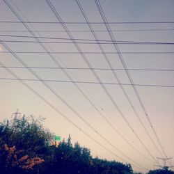 Low angle view of power lines