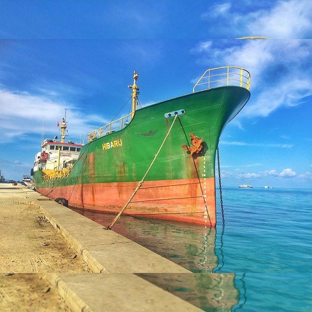 sky, water, blue, transportation, sea, cloud - sky, built structure, cloud, architecture, day, no people, outdoors, nautical vessel, mode of transport, building exterior, nature, horizon over water, sunlight, cloudy, rusty