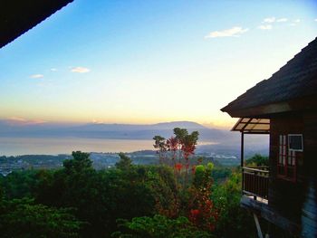 Scenic view of calm sea at sunset