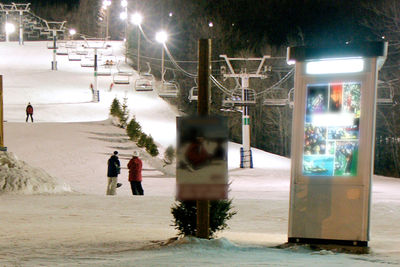 Men in city at night