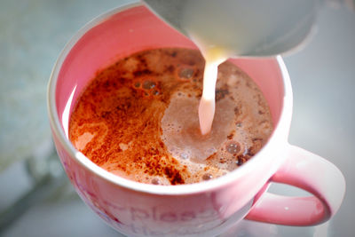 High angle view of coffee cup on table