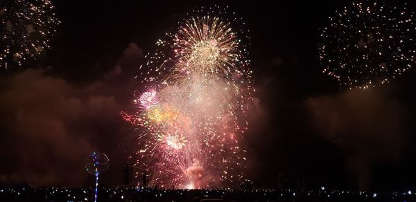 Firework display at night