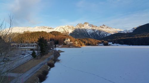 Scenic view of frozen landscape against sky