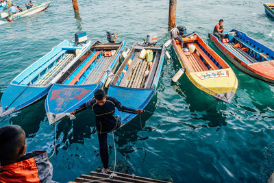 High angle view of people on sea