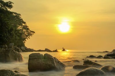 Scenic view of sea against sky during sunset