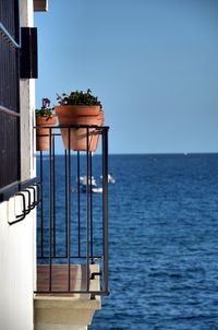 View of sea against clear blue sky