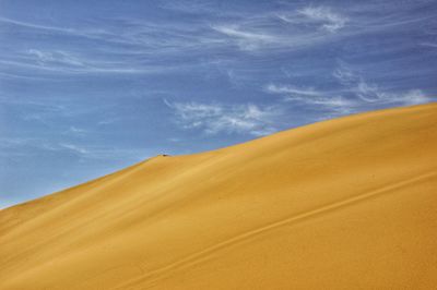 Scenic view of desert against sky