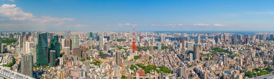 Aerial view of townscape against sky