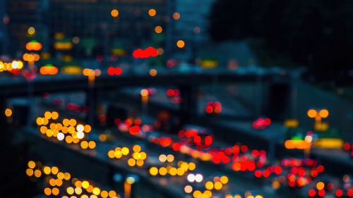 Illuminated city at night,car head  lighting