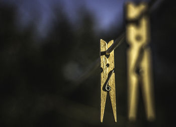 Close-up of clothespin on clothesline