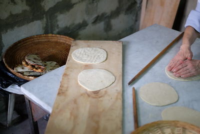 Close-up of rolling chapattis