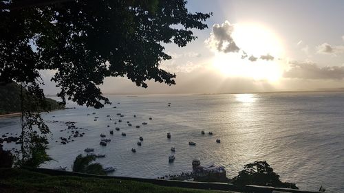 Scenic view of sea against sky at sunset