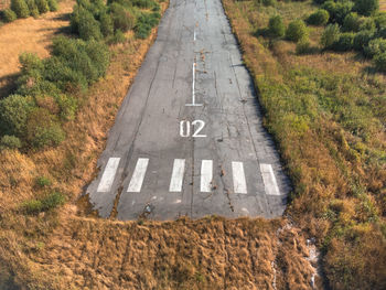 Runway of a small abandoned airfield. take-off road