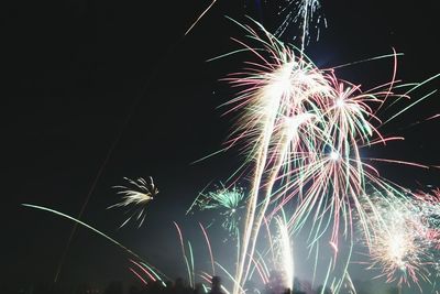 Firework display at night