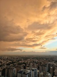 High angle view of townscape against sky during sunset