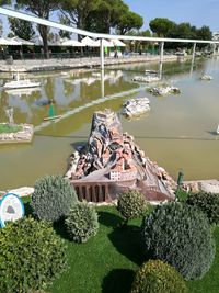 High angle view of plants and lake in garden