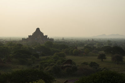 Scenic view of landscape against sky during sunset