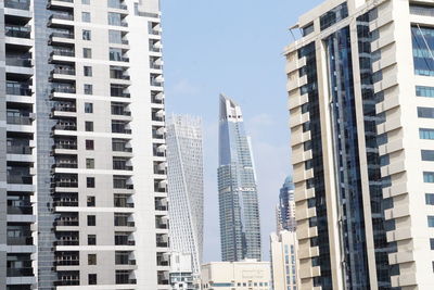 Low angle view of buildings against clear sky