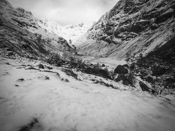 Scenic view of mountains against sky during winter