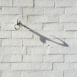 Hook mounted on white wall