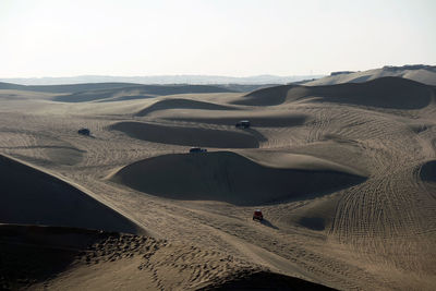 Scenic view of desert against clear sky