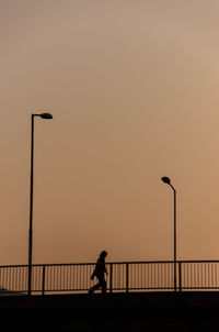 People standing on railing