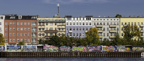 Buildings in city against sky