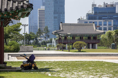 Gazebo at michuhol park against modern buildings