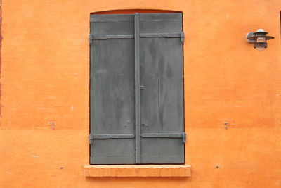 Close-up of closed window of building