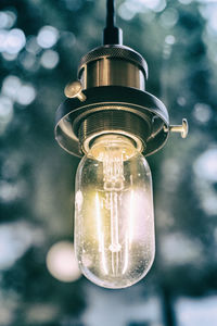 Close-up of illuminated light bulb