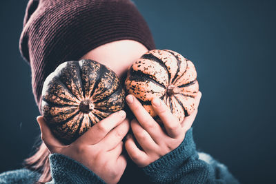 Close-up of hand holding ice cream