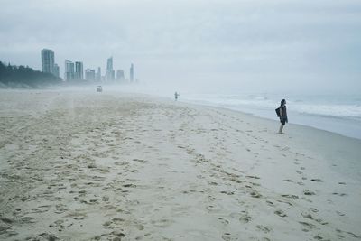 Silhouette of woman at beach